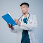Doctor reviewing records