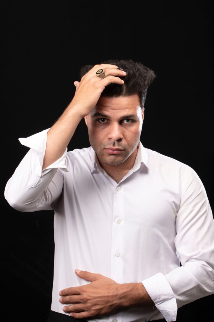 Man adjusting his hair
